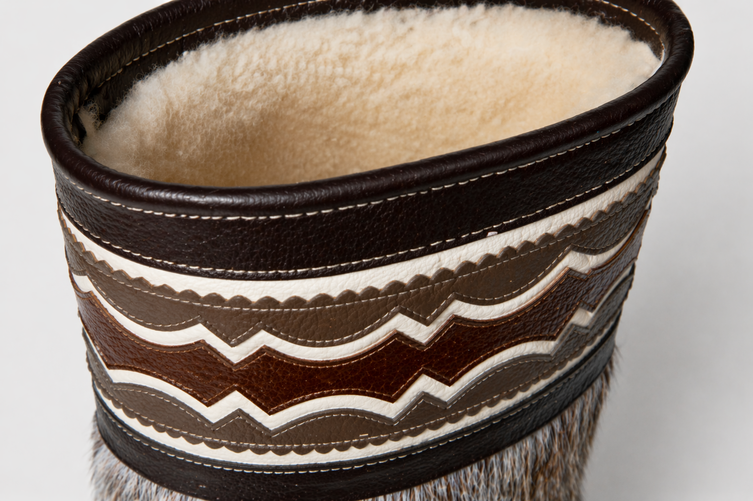 MOGSki boot detail showing natural fur upper and anti-slip rubber sole, luxury handcrafted Mongolian winter footwear construction