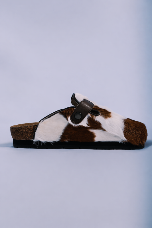 MOGSki natural fur mule clog on neutral background, genuine cowhide luxury handcrafted footwear from Inner Mongolia
