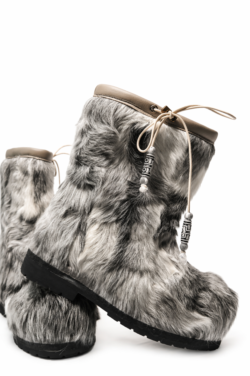MOGSki genuine fur ankle boots in sharp focus, natural hide luxury winter footwear handmade by Mongolian artisans