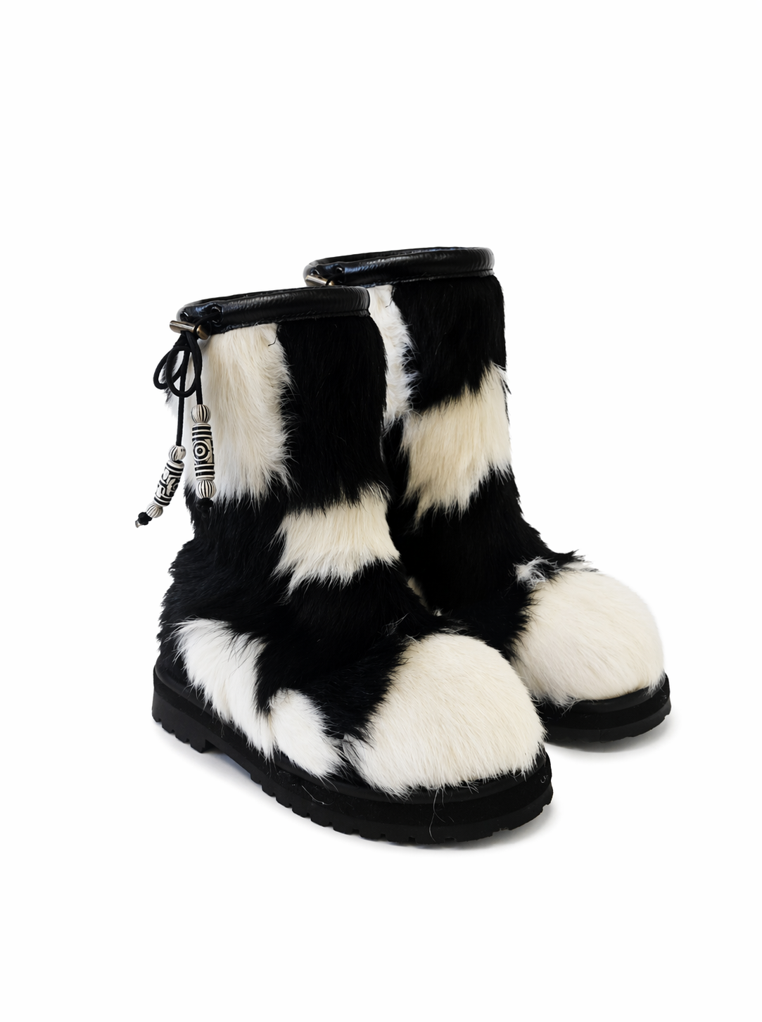 MOGSki handcrafted fur ankle boots, natural black and white cowhide pattern, luxury winter footwear from Inner Mongolia