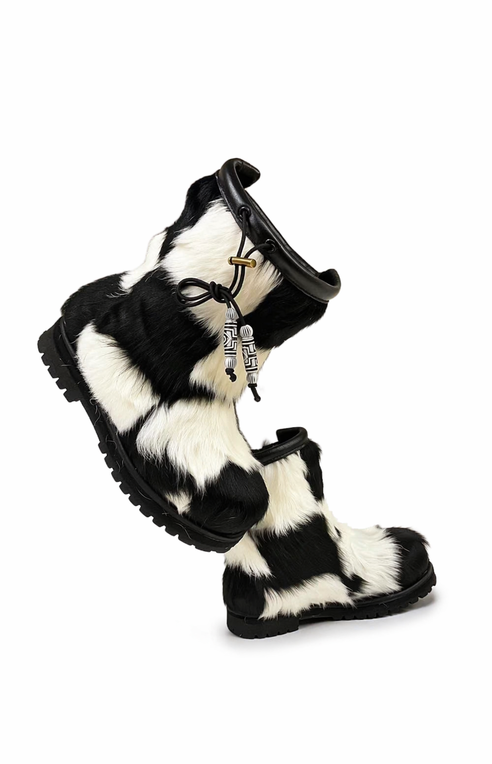 MOGSki luxury cowhide winter boots with natural black and white fur pattern, handcrafted artisan footwear Inner Mongolia