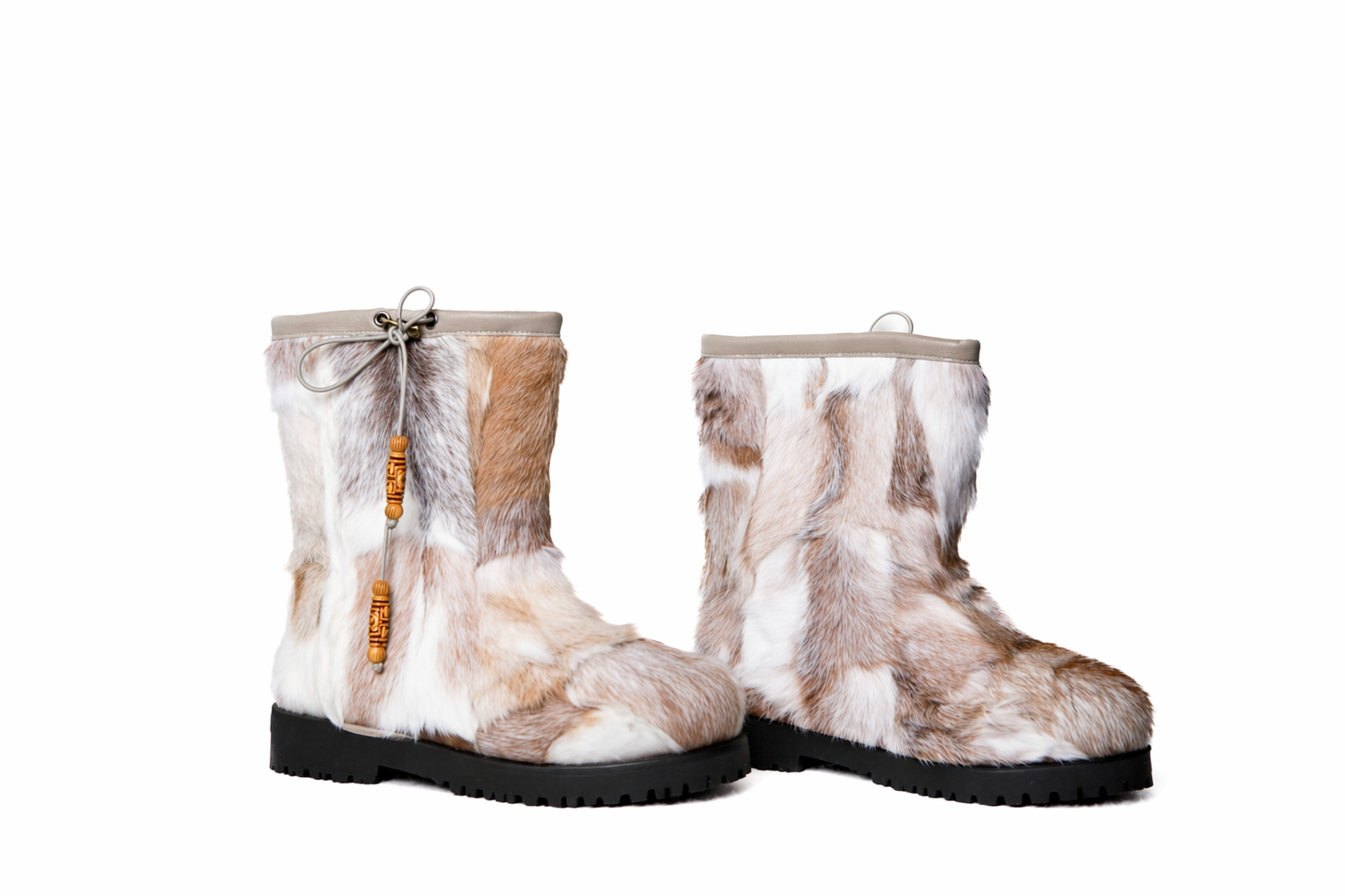 MOGSki natural sheepskin snow boots showing rich fur texture detail, luxury handcrafted winter boots Inner Mongolia