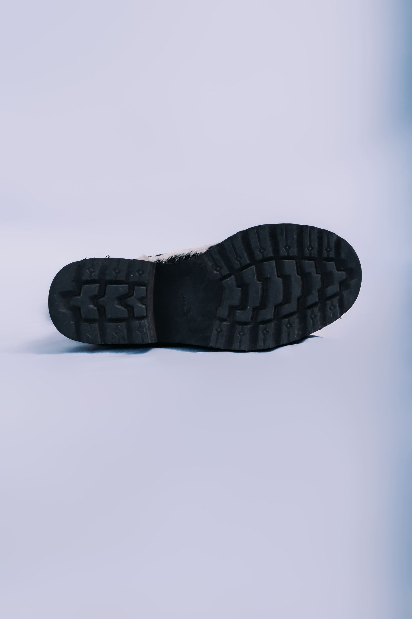 MOGSki luxury boot sole detail, anti-slip rubber outsole handcrafted Mongolian natural cowhide winter footwear