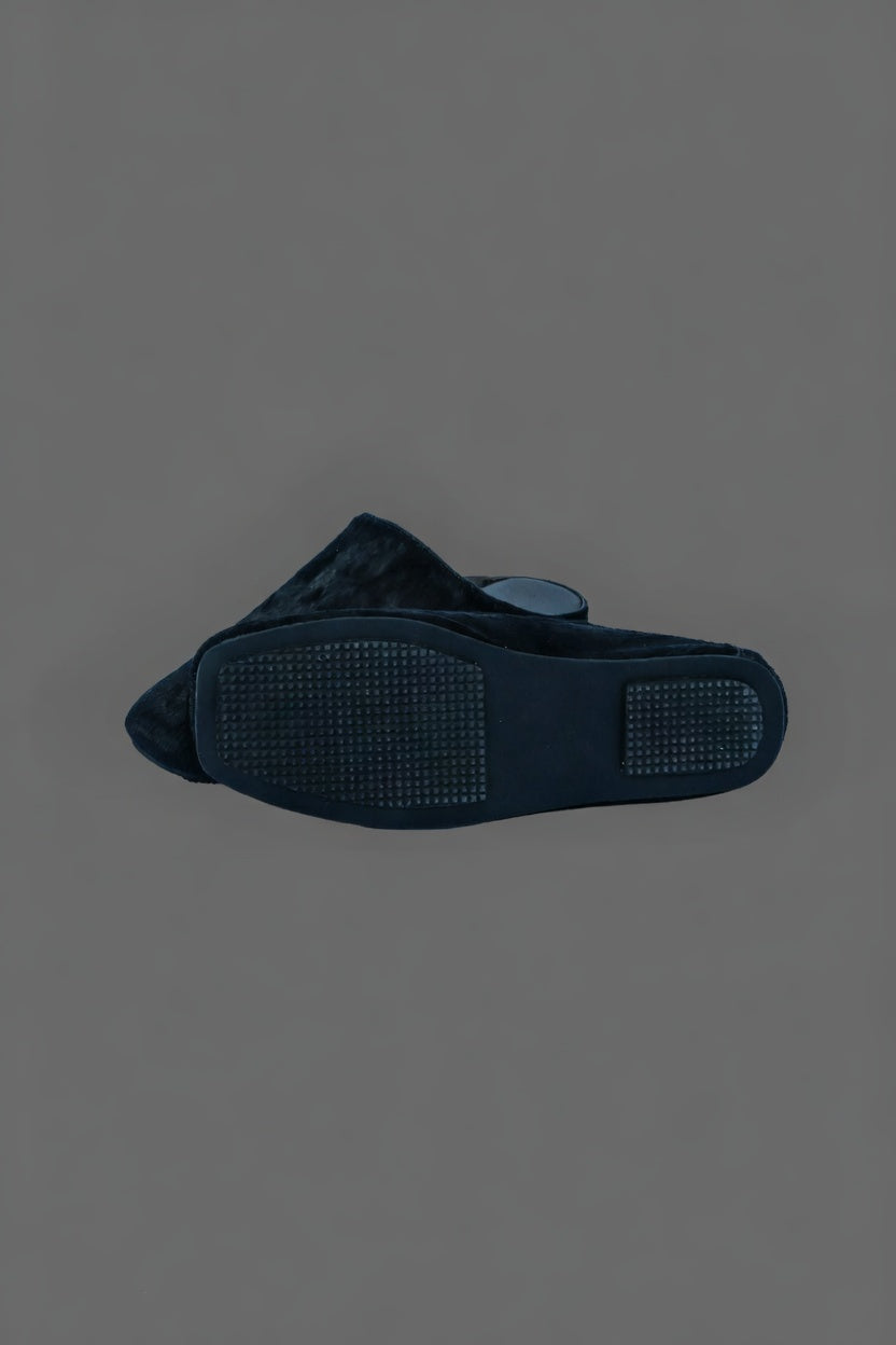 MOGSki natural dark mink fur clogs product shot on grey background, luxury handcrafted genuine fur footwear Inner Mongolia