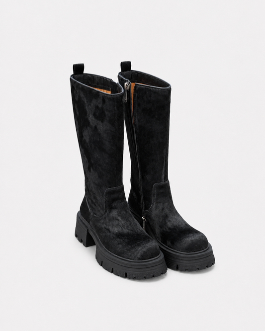 MOGSki Hair-On-Hide Tall Snow Boot in Black, black hair-on cowhide knee-high boot with side zip and platform lug sole