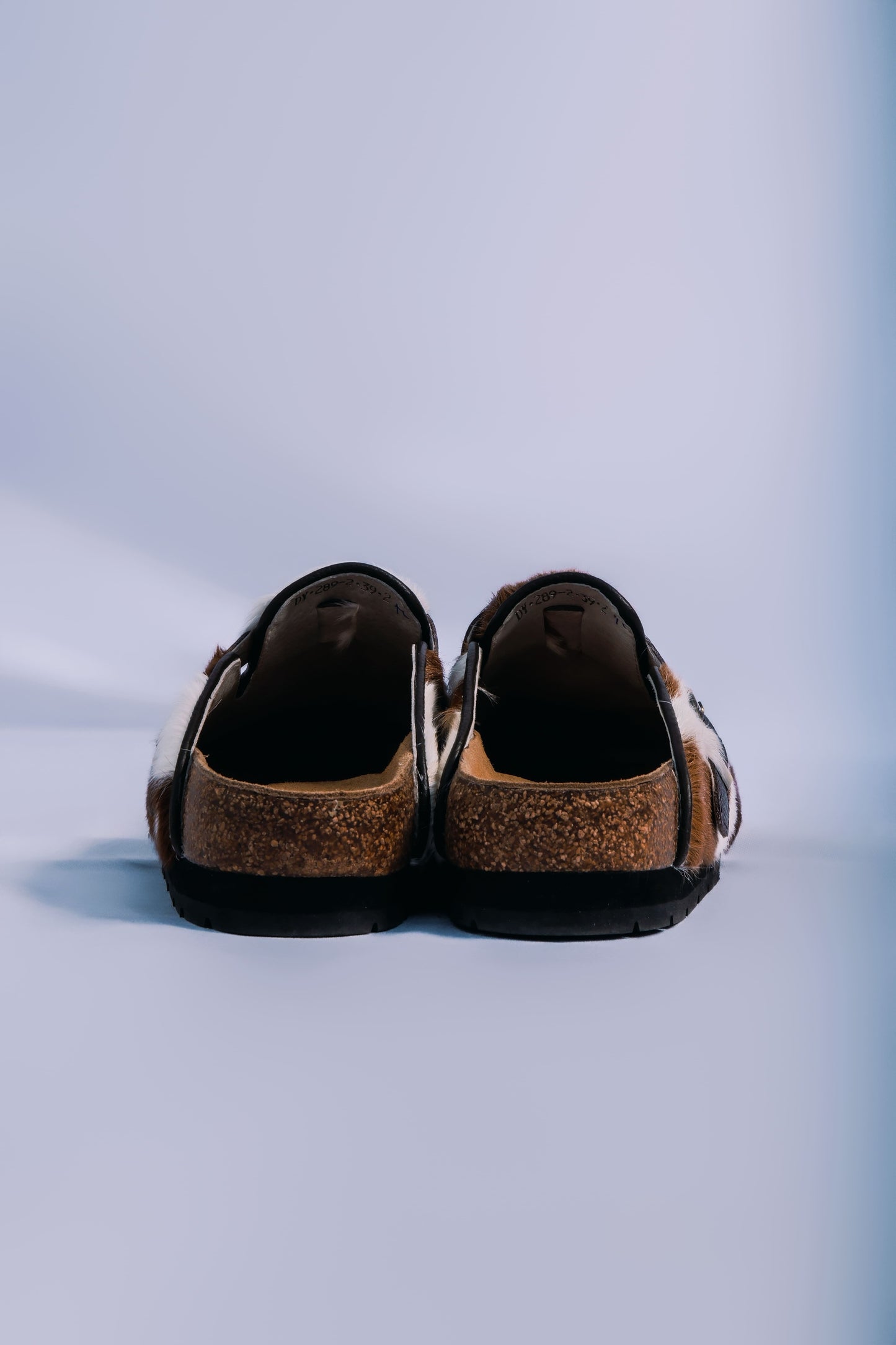 MOGSki handcrafted natural fur sandals pair top view product shot, luxury genuine hide spring summer footwear Inner Mongolia