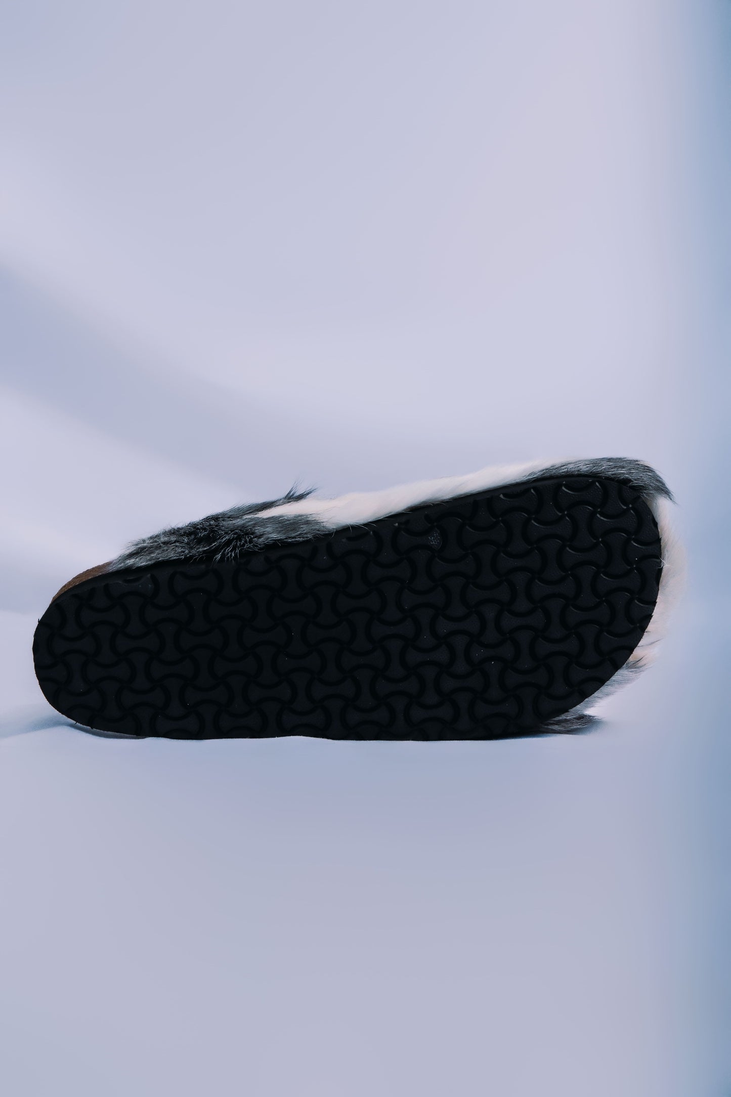 MOGSki natural fur sandals sole detail on clean background, luxury handcrafted genuine hide spring summer footwear Mongolia