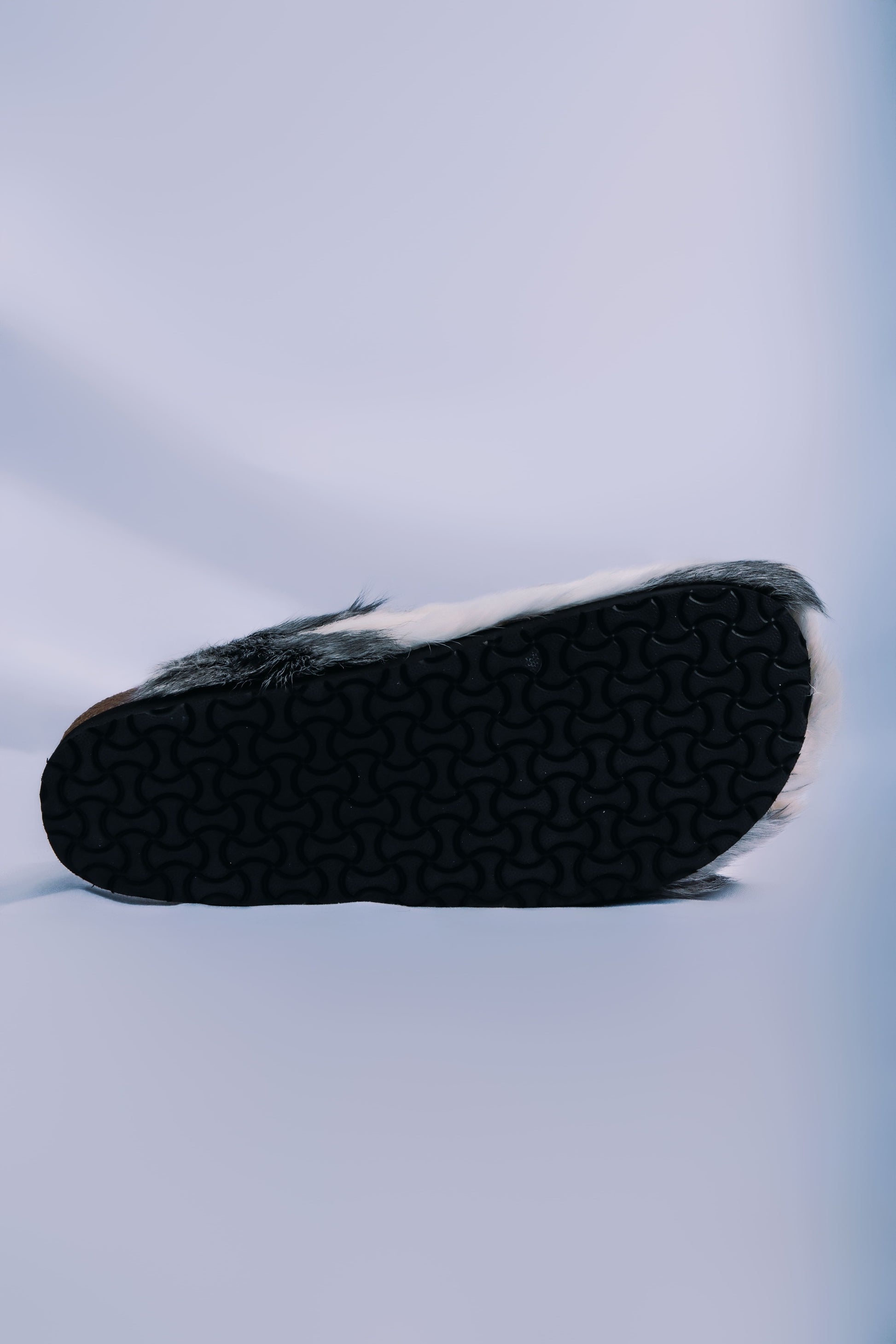 MOGSki natural fur sandals sole detail on clean background, luxury handcrafted genuine hide spring summer footwear Mongolia