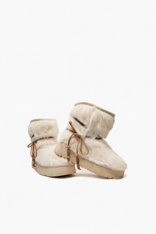 MOGSki natural sheepskin ankle boot pair, genuine undyed hide luxury handcrafted Mongolian footwear product photography