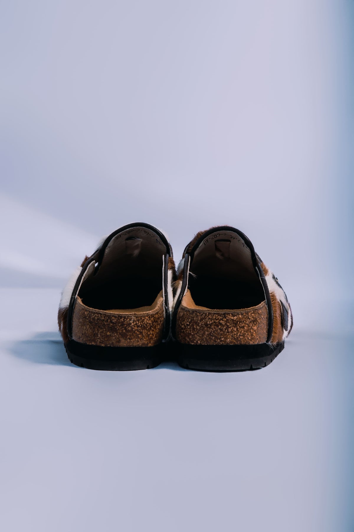 MOGSki handcrafted natural fur sandals pair top view product shot, luxury genuine hide spring summer footwear Inner Mongolia